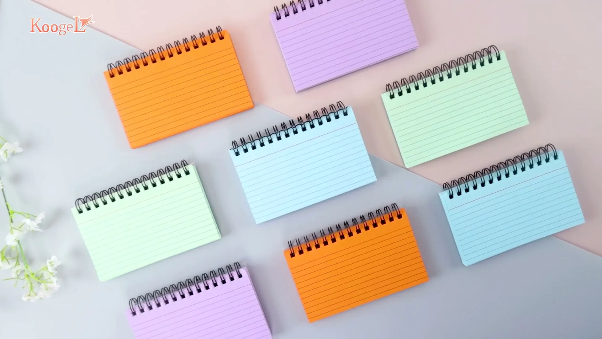Spiral index card decks laid out in four colors.